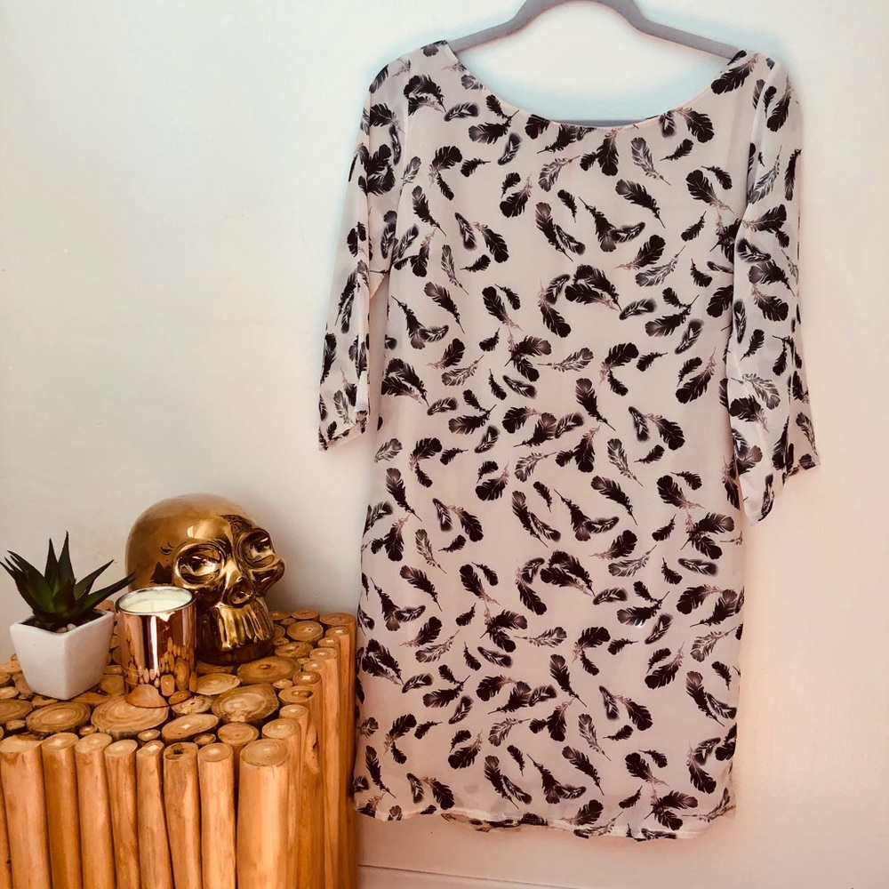 Cream feathers print dress